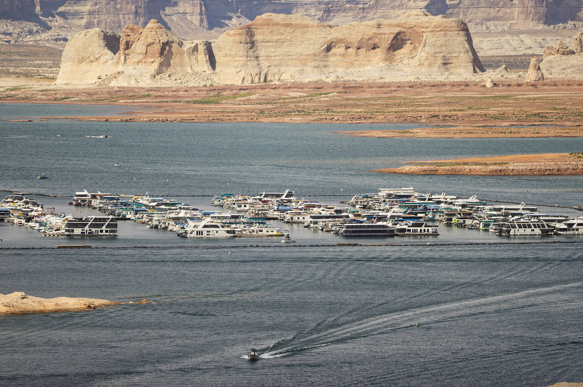 Boats and other watercraft are pictured near the Wahweap Marina at Lake Powell in the Glen Cany ...