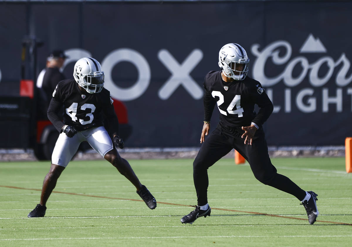 Raiders' Karl Joseph (43) and Johnathan Abram (24) run through drills during training camp at R ...