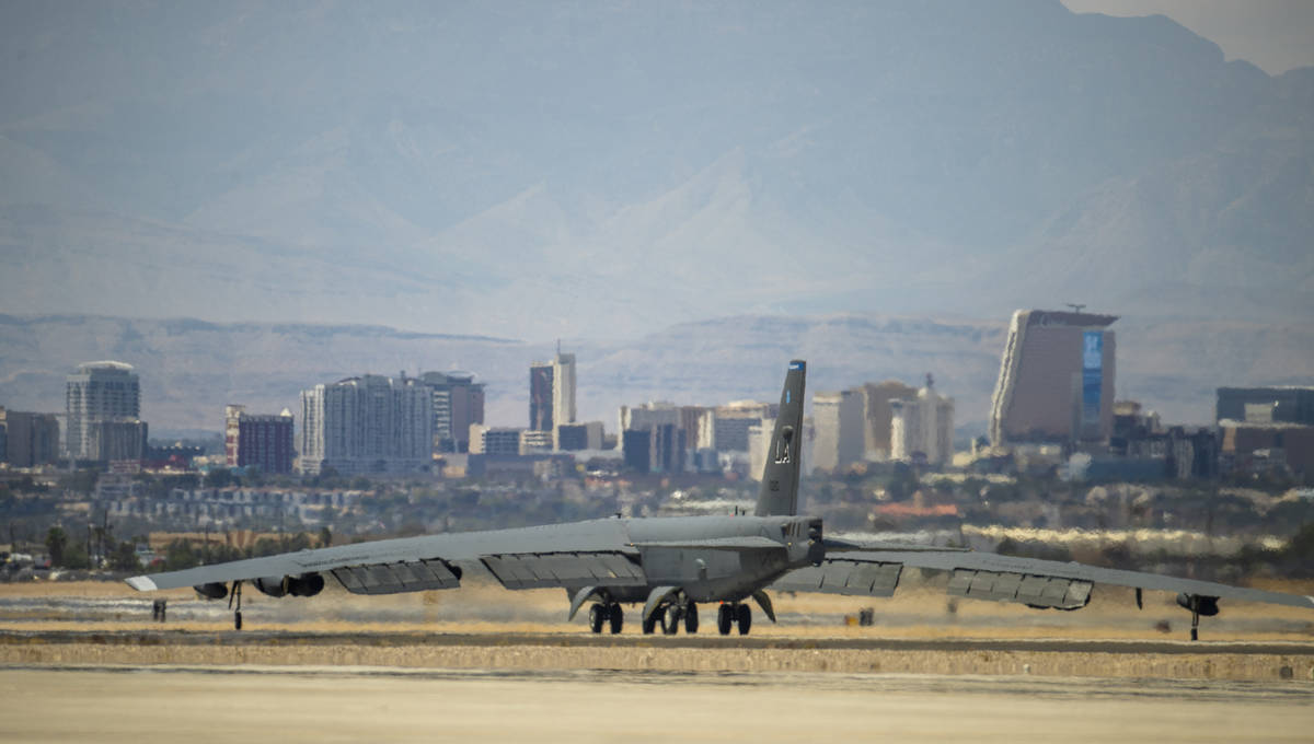 A B-52 Bomber rolls down the runway before takeoff as Nellis Air Force Base is hosting a RED FL ...