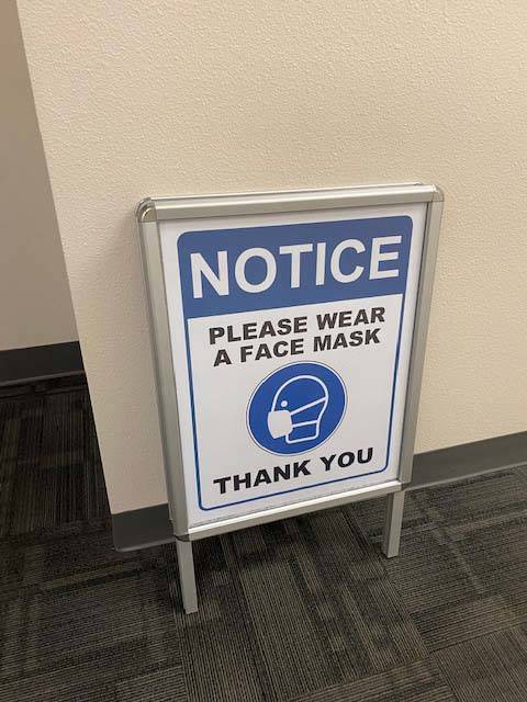 Signs at the Regional Justice Center in Las Vegas asking people to wear masks inside the buildi ...