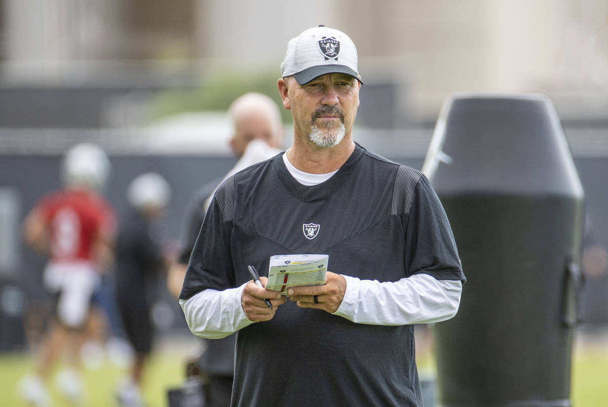 Raiders New Defensive Coordinator Gus Bradley observes his players during training camp at the ...