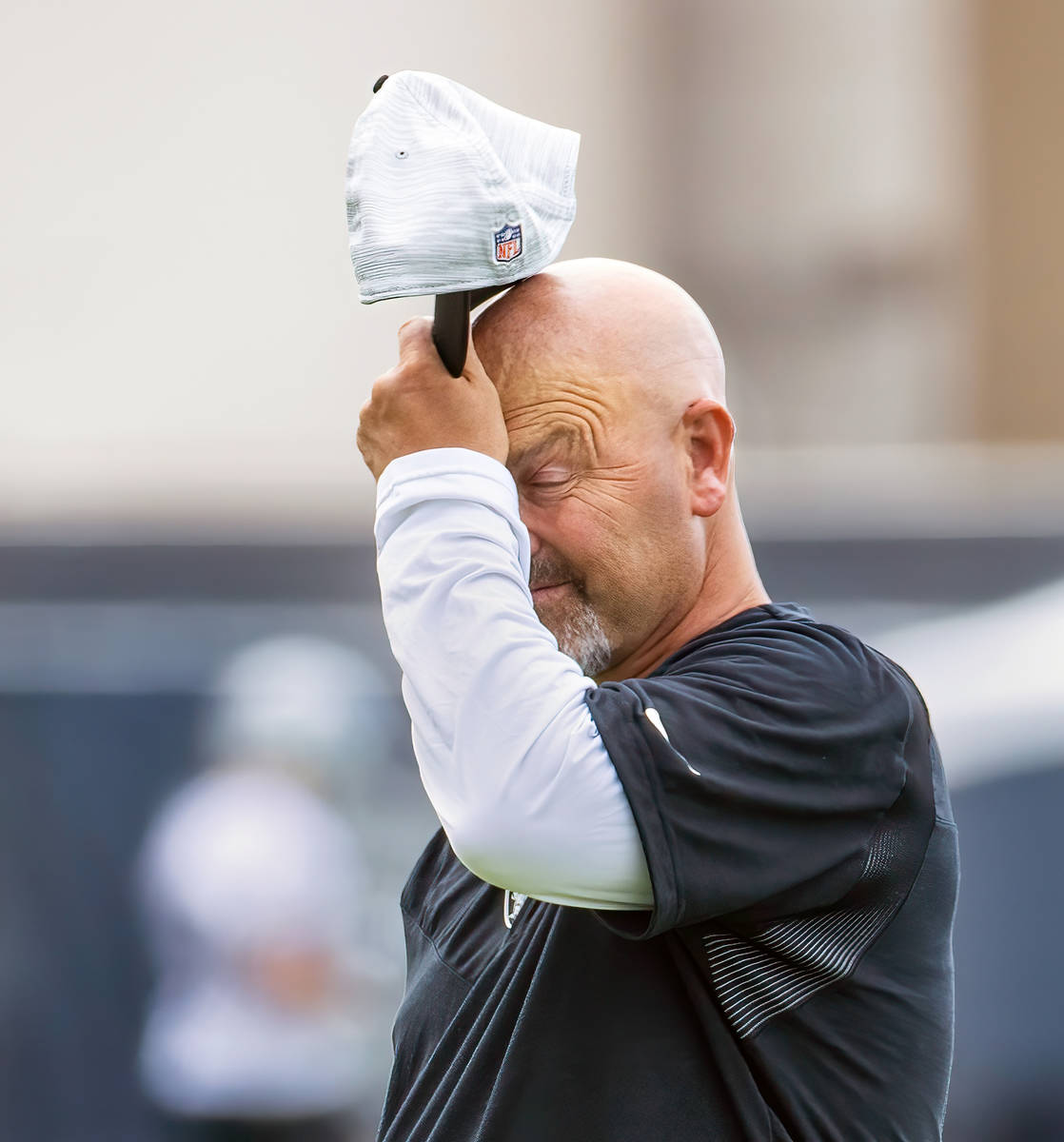 Raiders New Defensive Coordinator Gus Bradley takes a moment to close his eyes during training ...