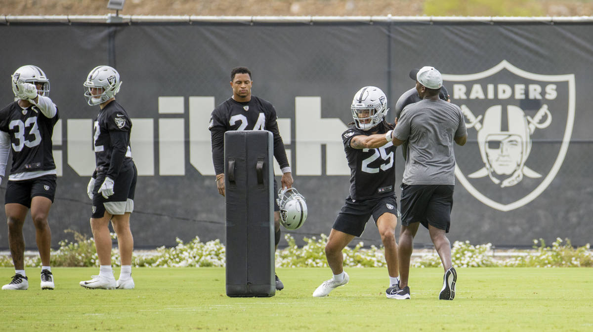 Raiders safety Trevon Moehrig (25) runs a drill with teammates during training camp at the Inte ...