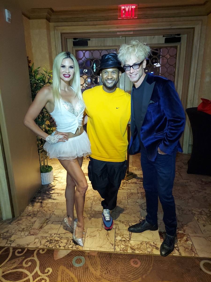 Usher is shown with Dani Elizabeth and Murray Sawchuck at "Fantasy" at Luxor on Thursday, July ...