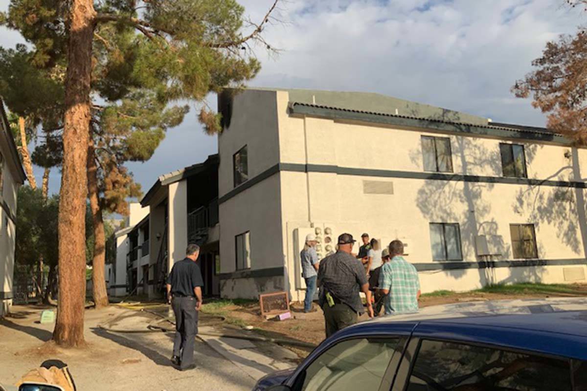 Crews battle a fire Saturday, July 31, 2021, at 1825 Lewis Ave. in Las Vegas. (Las Vegas Fire D ...