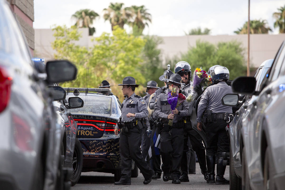 After a procession for Nevada Highway Patrol trooper Micah May's body from University Medical C ...
