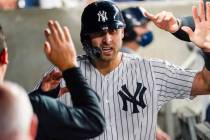 New York Yankees' Joey Gallo celebrates with teammates after scoring during the fourth inning o ...