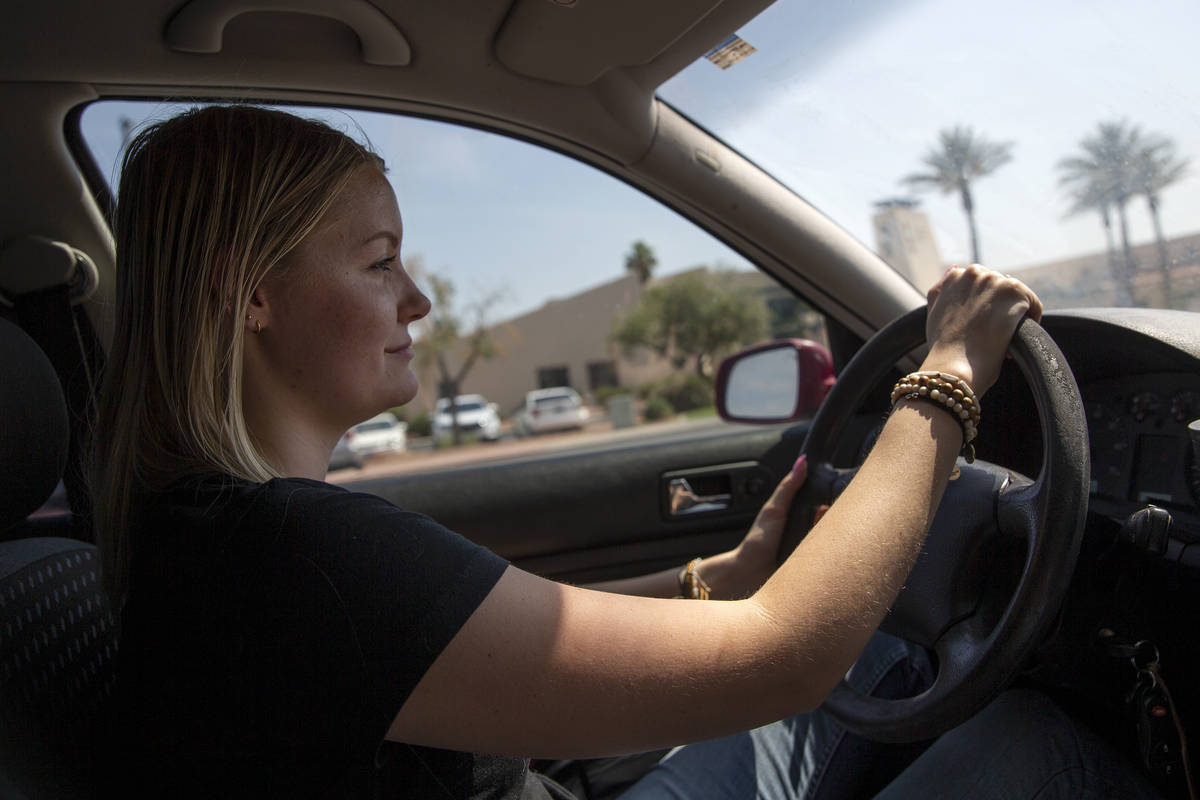Kylee Tobler Fuqua drives home, past Mesquite City Hall, from dropping her sister off at a frie ...