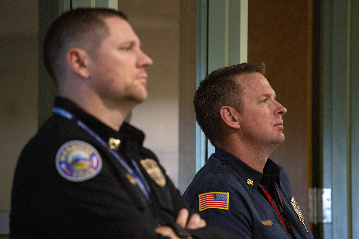Police chief Maquade Chesley, right, listens during a a city council meeting at Mesquite City H ...