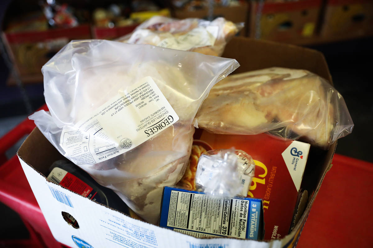 A box of food for guests to pick up at Catholic Charities of Southern Nevada on Thursday, July ...