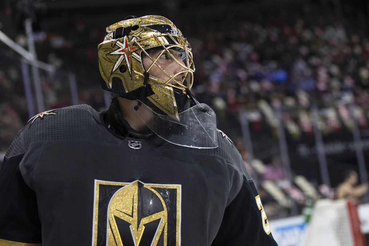 Golden Knights goaltender Marc-Andre Fleury (29) skates around the goal during the second perio ...