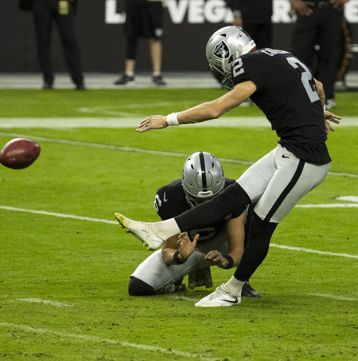 Las Vegas Raiders Kicker Daniel Carlson (2) kicks the field goal during the third quarter of an ...