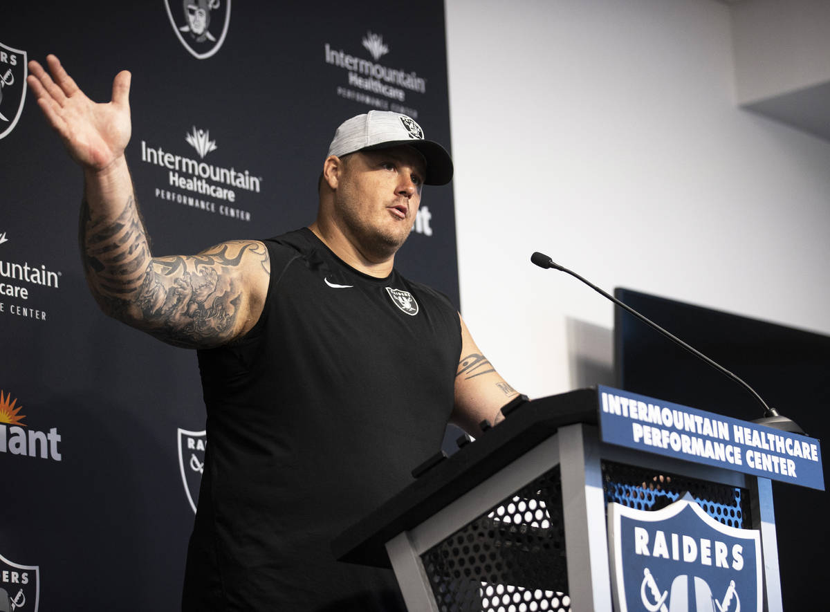 Raiders offensive guard Richie Incognito (64) speaks to the media after training camp on Monday ...