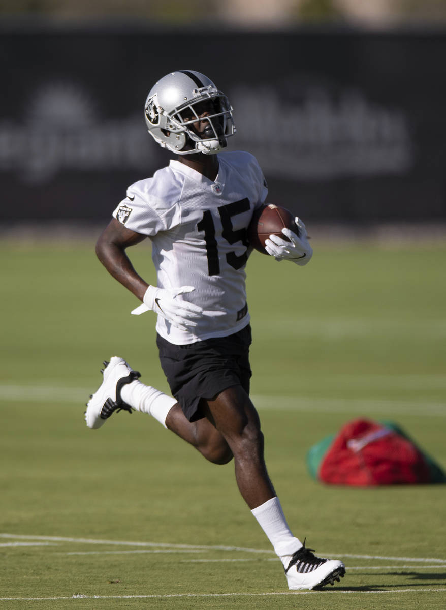 Raiders wide receiver John Brown (15) runs through drills during training camp on Monday, Aug. ...