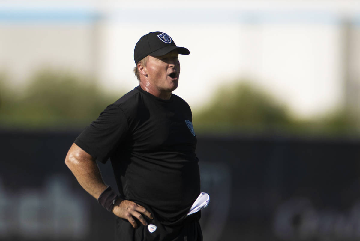 Raiders head coach Jon Gruden leads practice during training camp on Monday, Aug. 2, 2021, at R ...