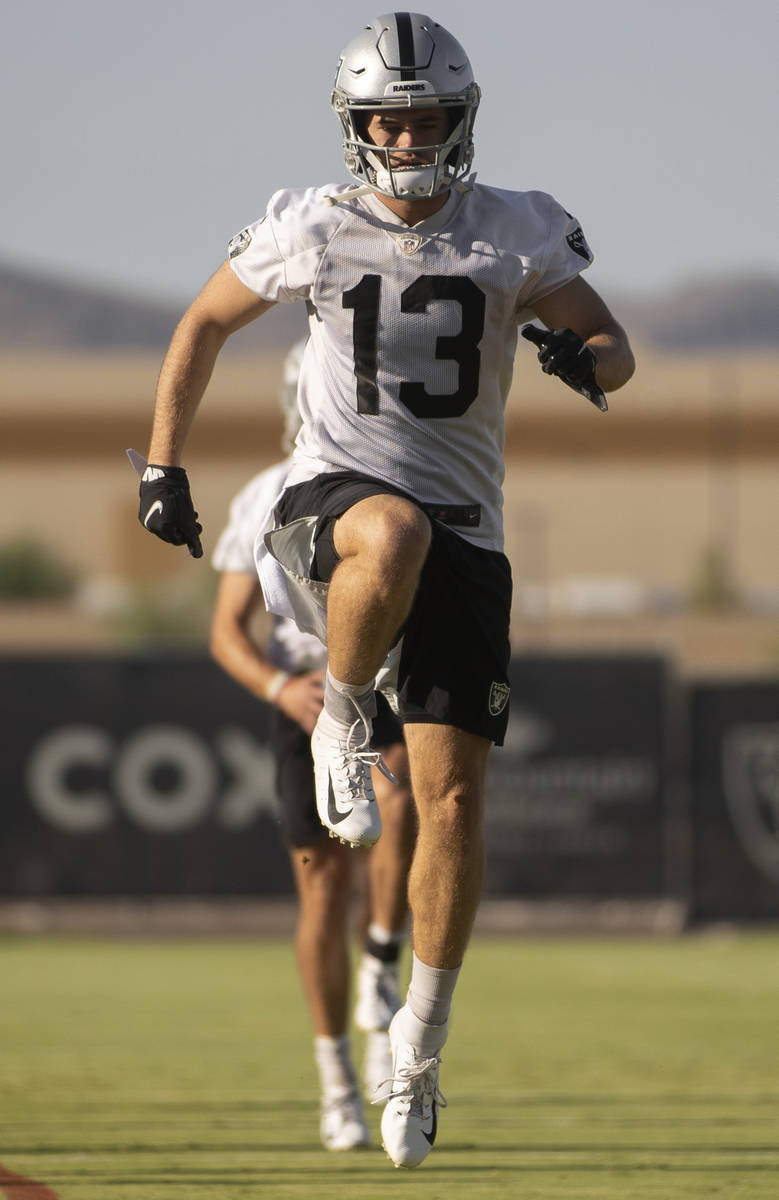 Raiders wide receiver Hunter Renfrow (13) stretches during training camp on Monday, Aug. 2, 202 ...