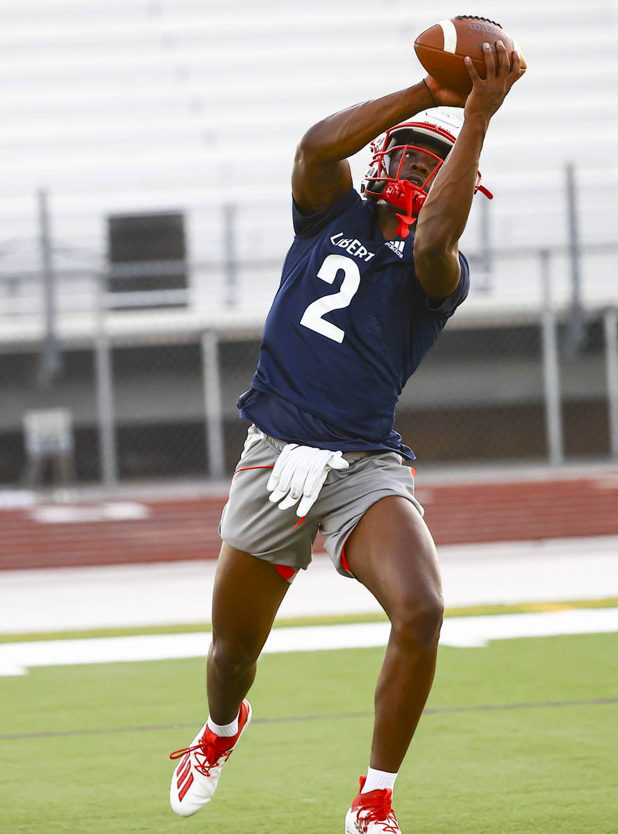 Liberty wide receiver Germie Bernard makes a catch during football practice in Henderson on Mon ...