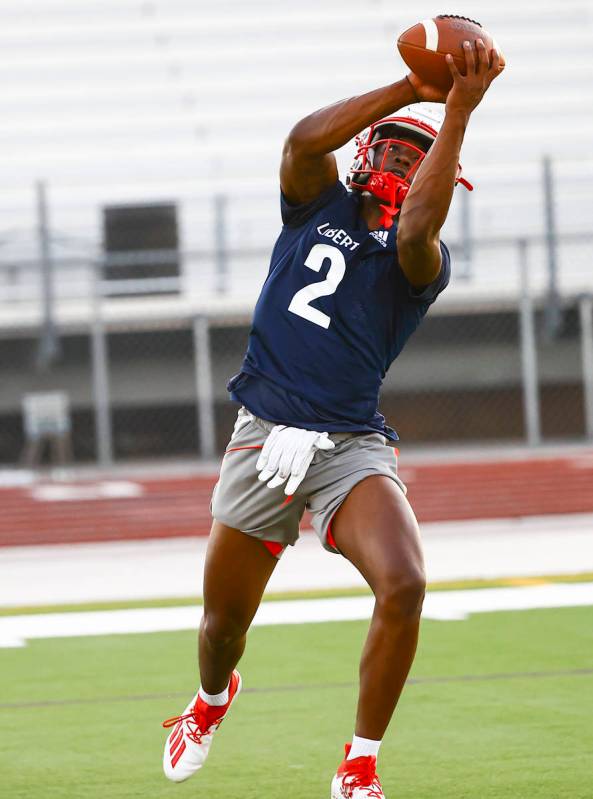 Liberty wide receiver Germie Bernard makes a catch during football practice in Henderson on Mon ...