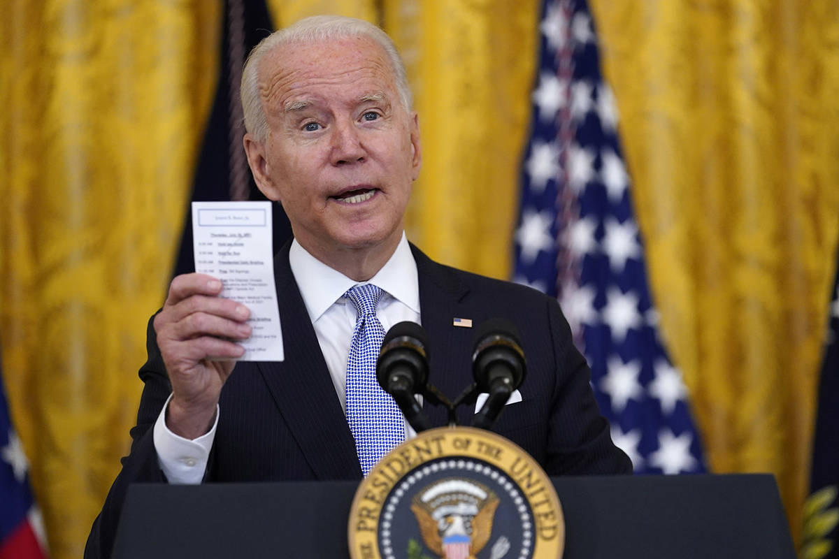 US hits Biden’s vaccination goal — a month late, amid surge