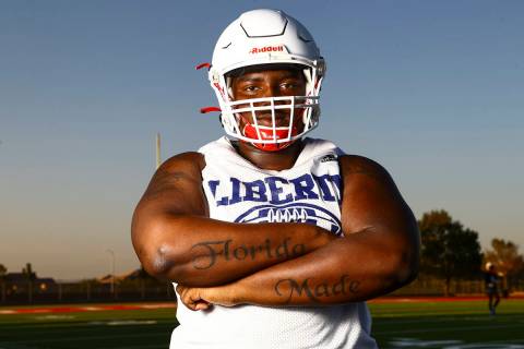 Liberty's Sir Mells poses for a portrait during football practice in Henderson on Monday, Aug. ...