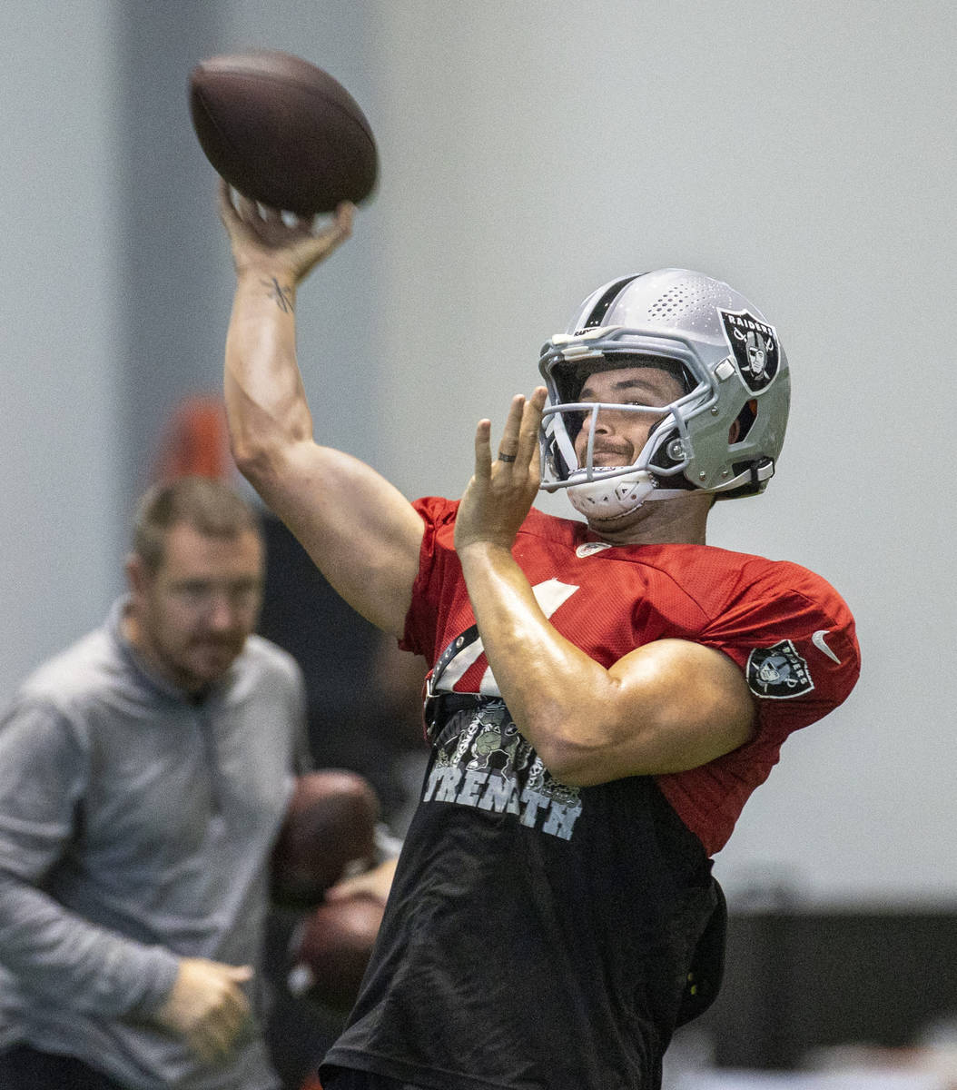 Raiders quarterback Derek Carr (4) throws to a receiver during practice at the Intermountain He ...