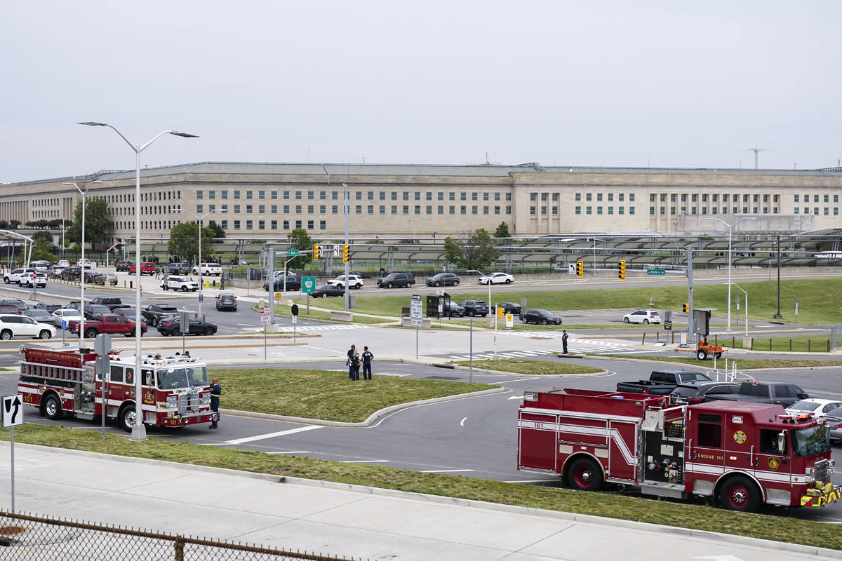 Emergency vehicles are seen outside the Pentagon Metro area Tuesday, Aug. 3, 2021, at the Penta ...