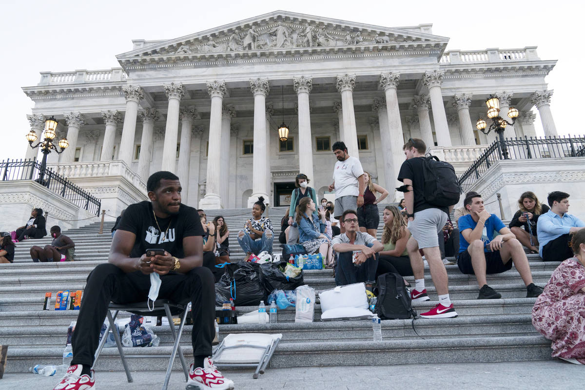 Supporters of Rep. Cori Bush, D-Mo., camp with her outside the U.S. Capitol, in Washington, Mon ...