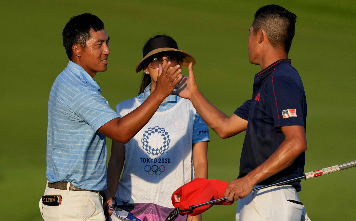 Cheng Pan of Taiwan, left, is congratulated by Collin Morikawa of the United States after winni ...