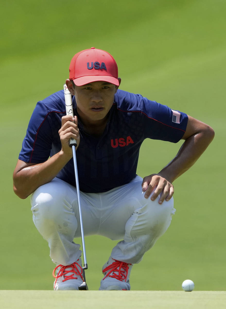 Collin Morikawa of United States studies his putt connected  the 5th spread   during the last  circular  of the ...