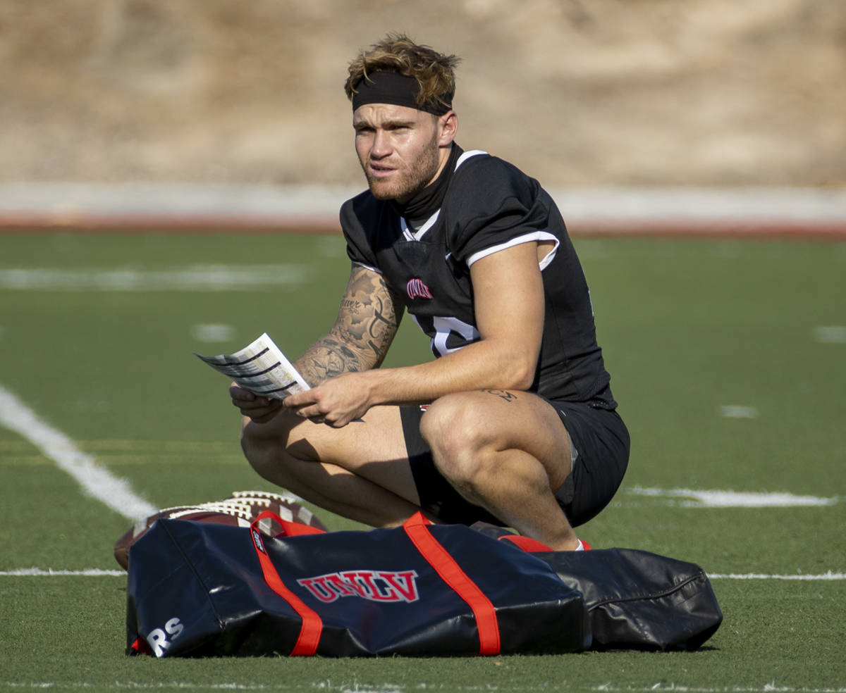 UNLV quarterback Tate Martell (16) observes his teammates during football team practice at Rebe ...