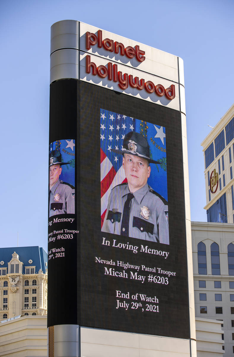Planet Hollywood shows their support as the processional for Nevada Highway Patrol trooper Mica ...