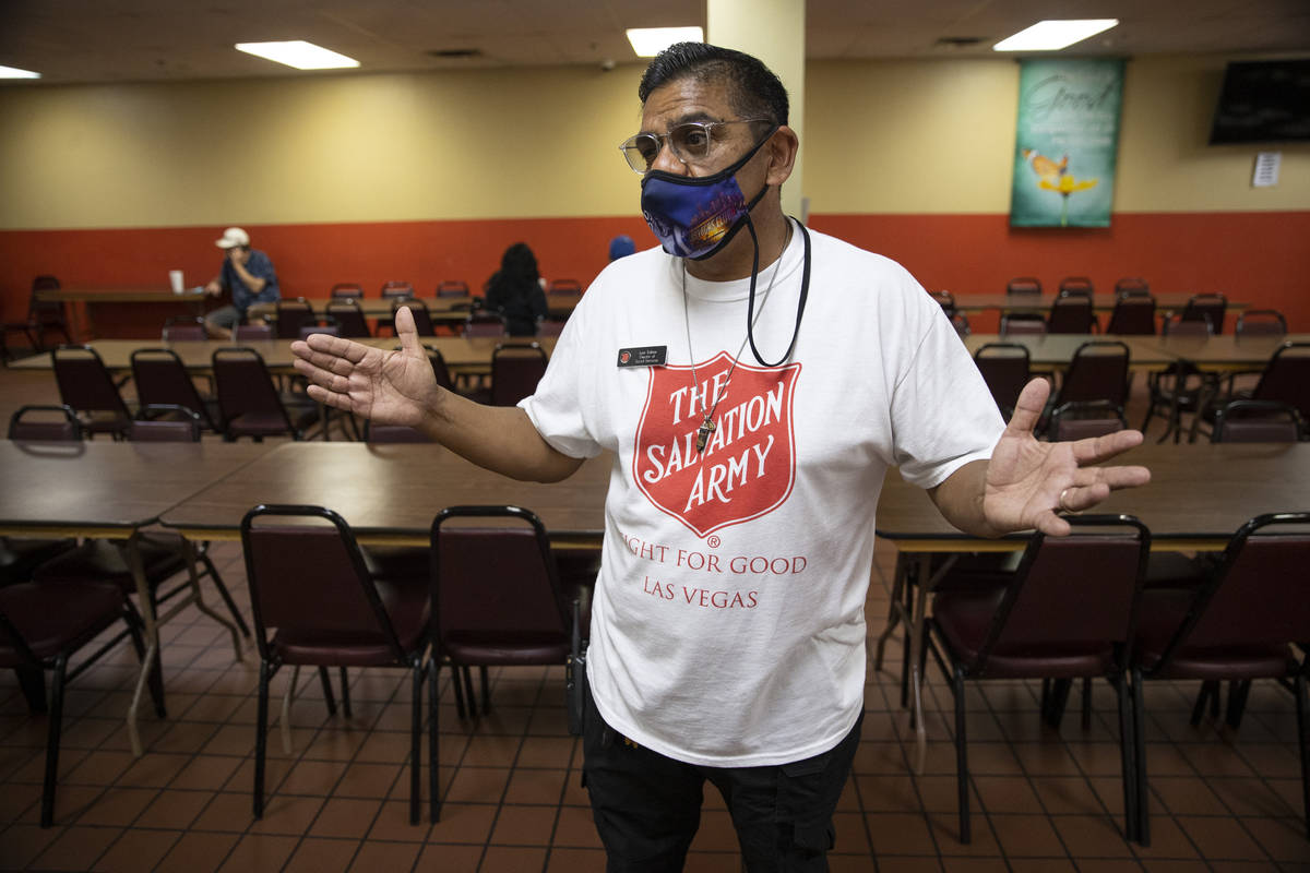 Juan Salinas, director of social services for the Salvation Army, gives a tour of the Salvation ...