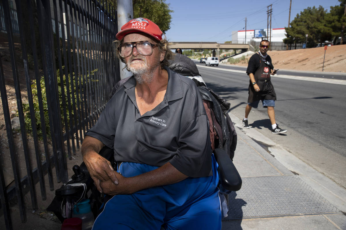 Homeless man Timothy Bartley sits on his wheelchair in front of the Salvation Army in Las Vegas ...