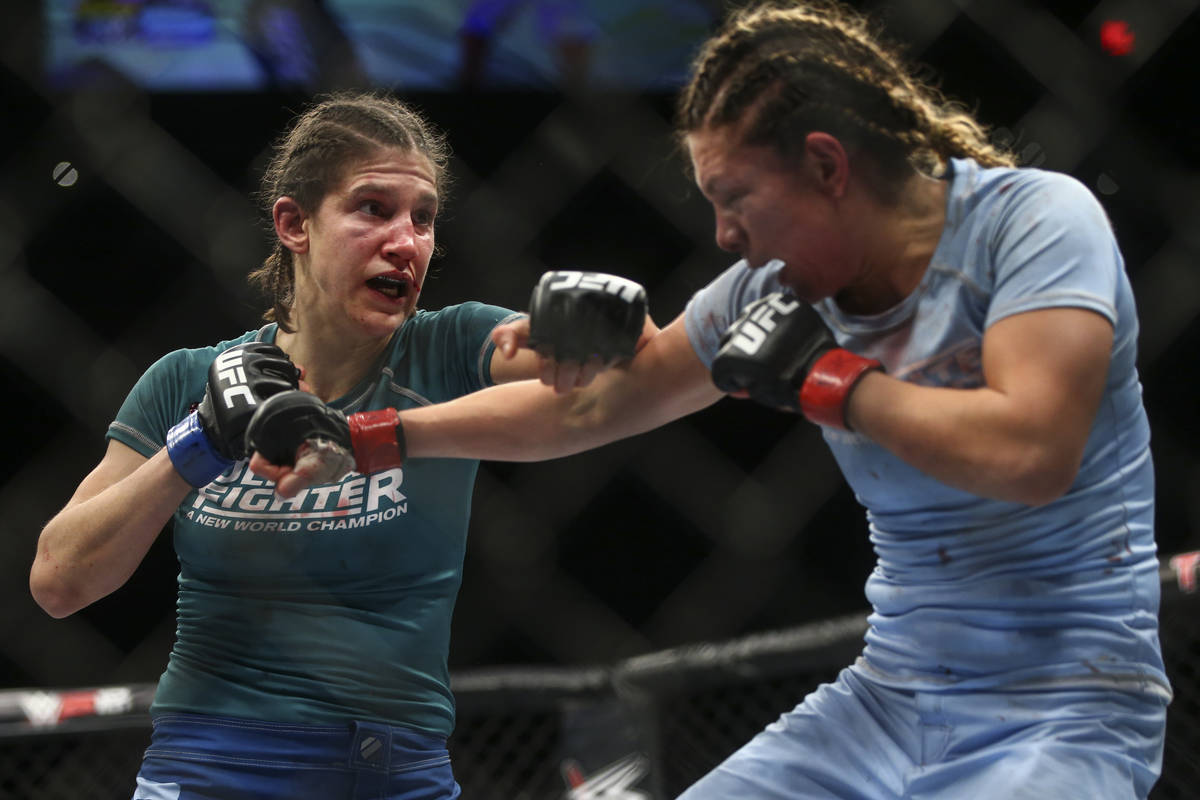 Roxanne Modafferi, left, fights Nicco Montano during a women's flyweight title bout at the Par ...