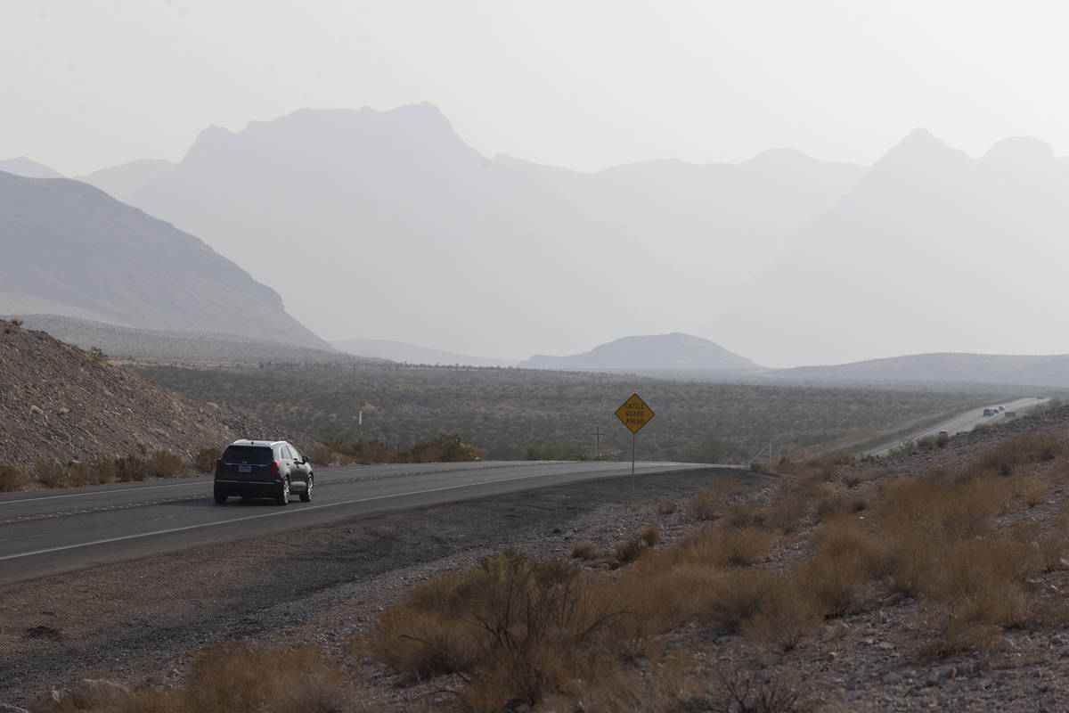 Smoky skies are seen from Red Rock Canyon in Las Vegas, Saturday, Aug. 7, 2021. (Erik Verduzco ...