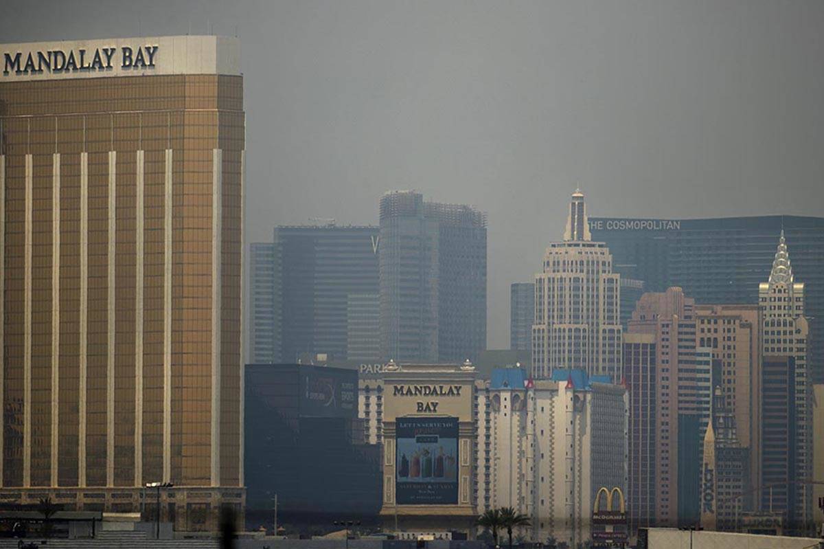 The Mandalay Bay and New York-New York with others covered by wildfire smoke drifting into the ...