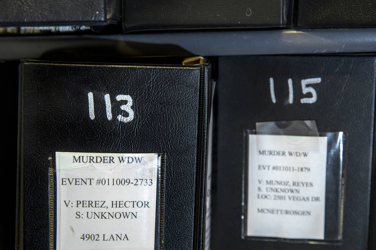 Cold case binders for the Hector Perez investigation amongst the many others within a storage r ...