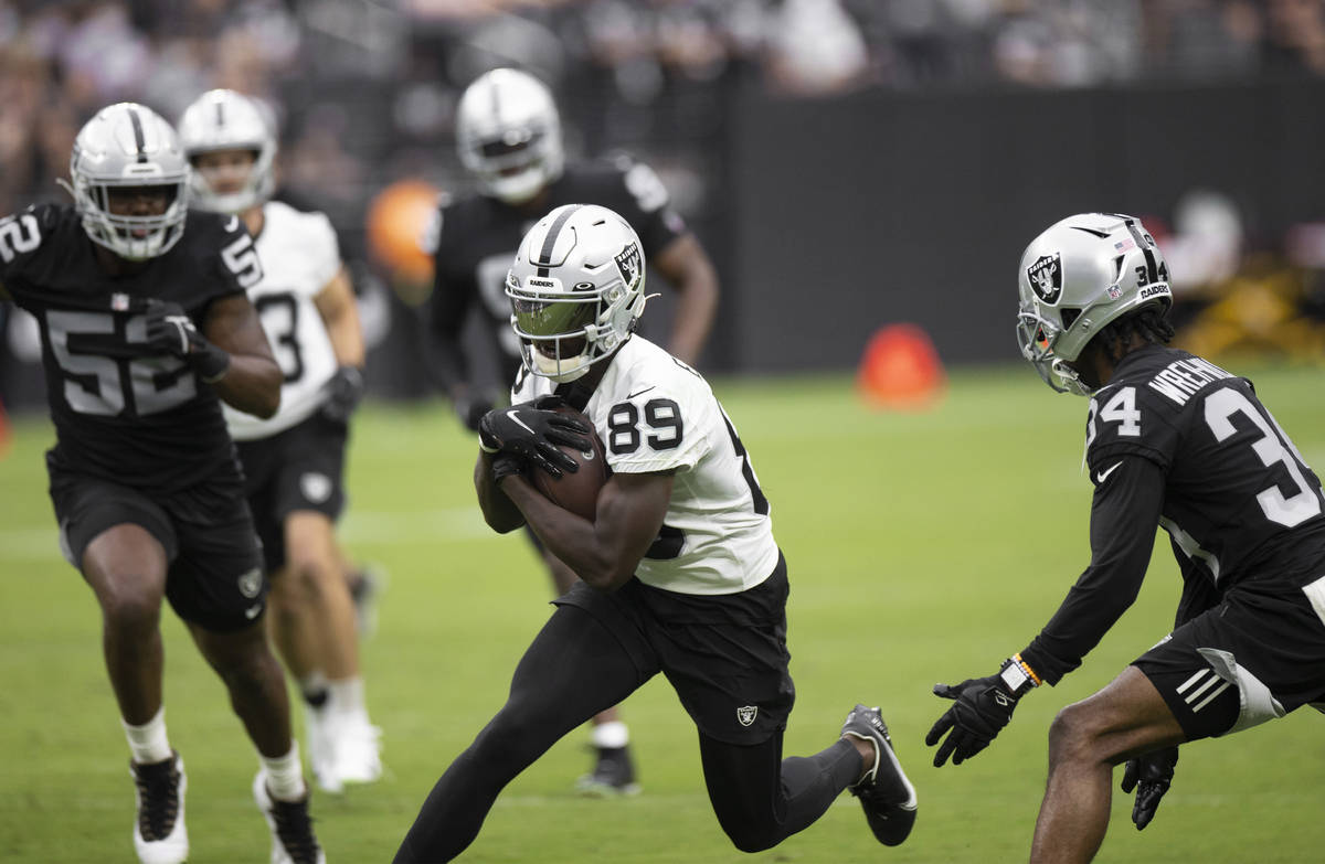 Raiders wide receiver Bryan Edwards (89) makes a big catch and run during a special training ca ...