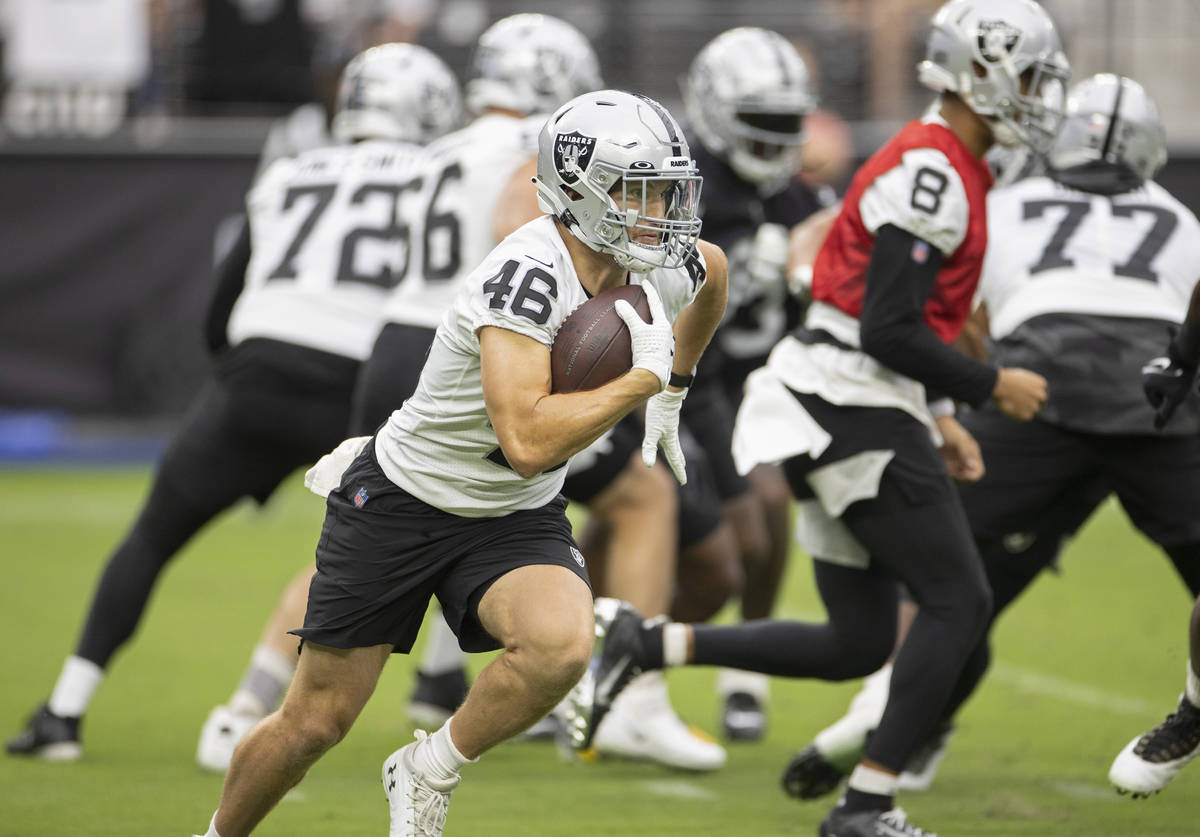 Raiders running back Garrett Groshek (46) breaks free for a big run during a special training c ...