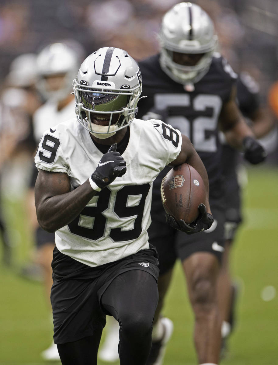 Raiders wide receiver Bryan Edwards (89) makes a big catch and run during a special training ca ...