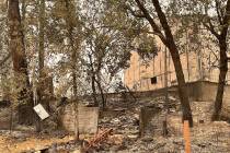 A structure sits damaged from the River Fire Friday, Aug. 6, 2021 in Chicago Park, Calif. Fir ...