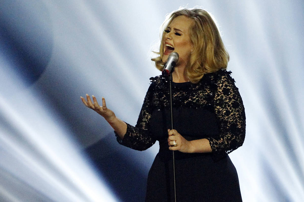 Adele performs during the Brit Awards 2012 at the O2 Arena in London, Tuesday, Feb. 21, 2012. ( ...