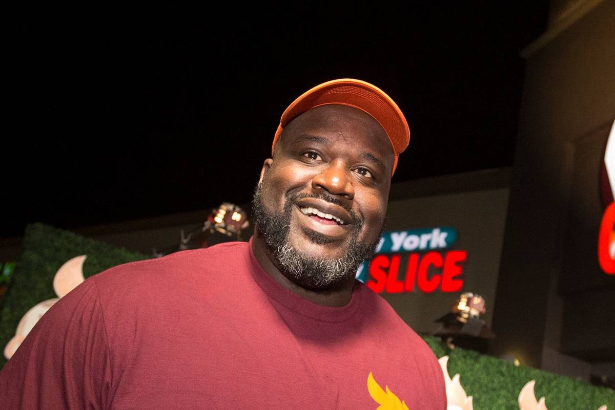 Shaquille O'Neal smiles during the grand opening celebration of Big Chicken, Shaq's fast-casual ...