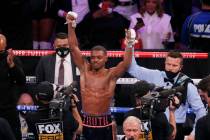 Errol Spence Jr. celebrates after defeating Danny Garcia by unanimous decision in the WBC-IBF w ...