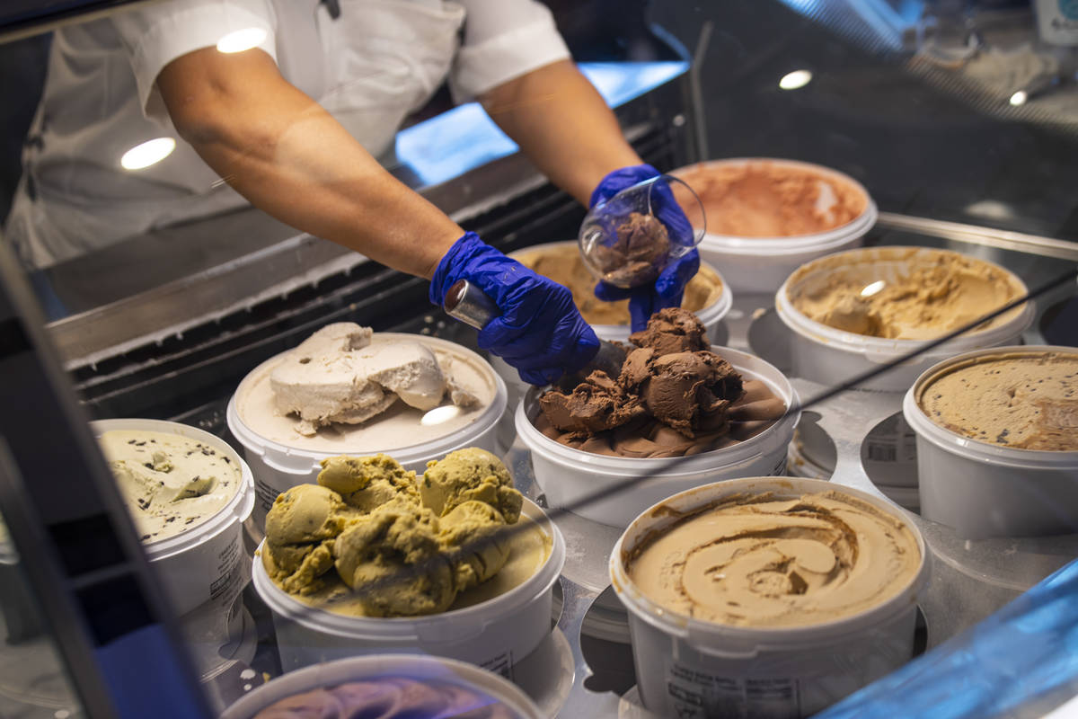 Fountain worker Maria Casian scoops ice cream at Craig's Vegan in The District at Resorts World ...