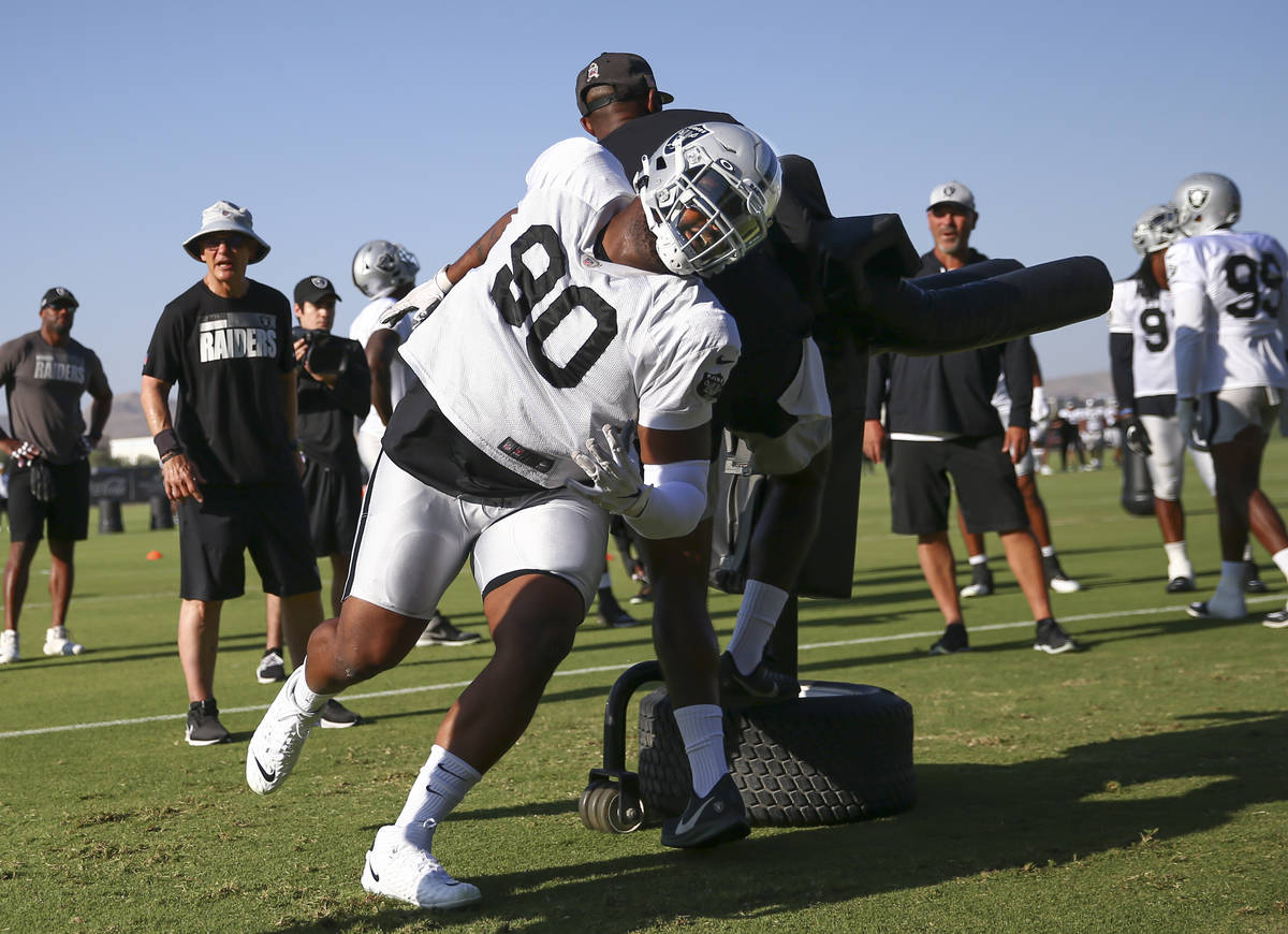 Raiders defensive tackle Johnathan Hankins participates in drills during training camp at Raide ...