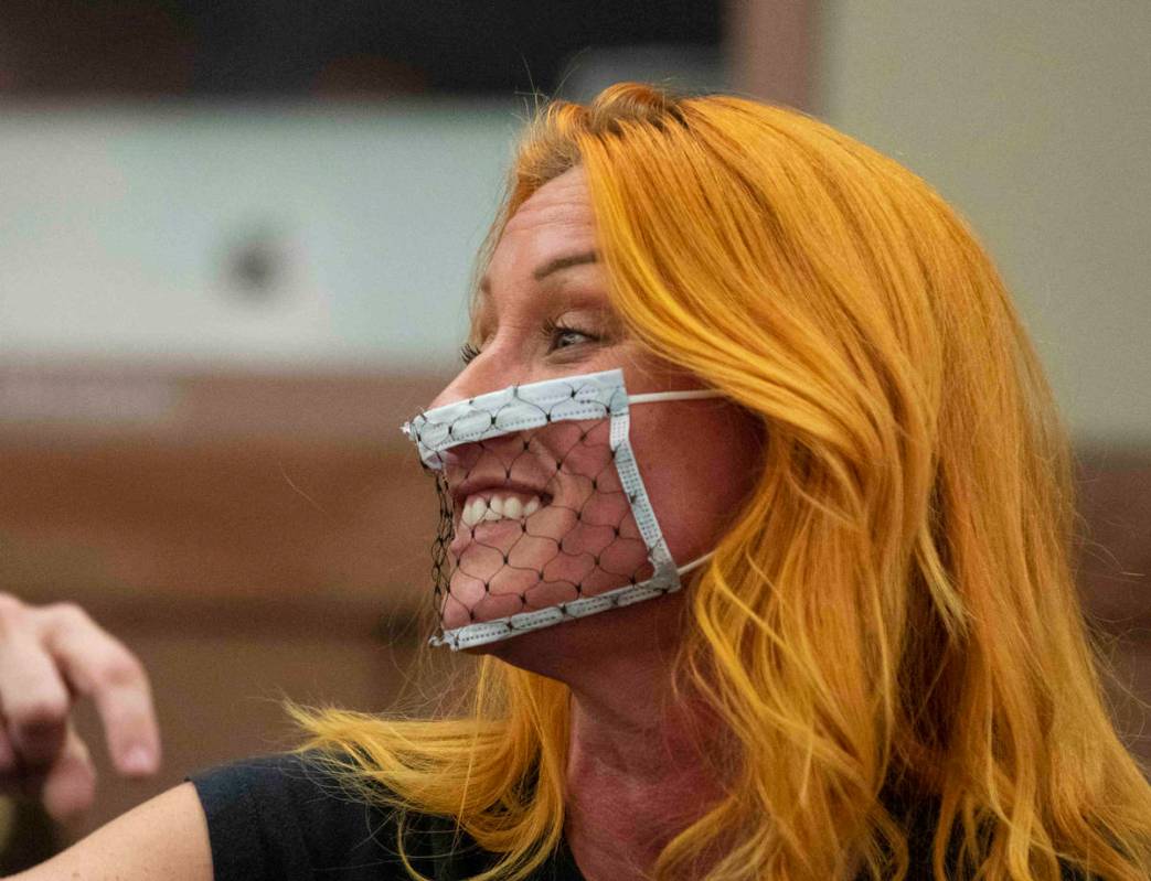 Stephanie Kinsley, protesting against a COVID-19 mandate, reacts during the Clark County Schoo ...