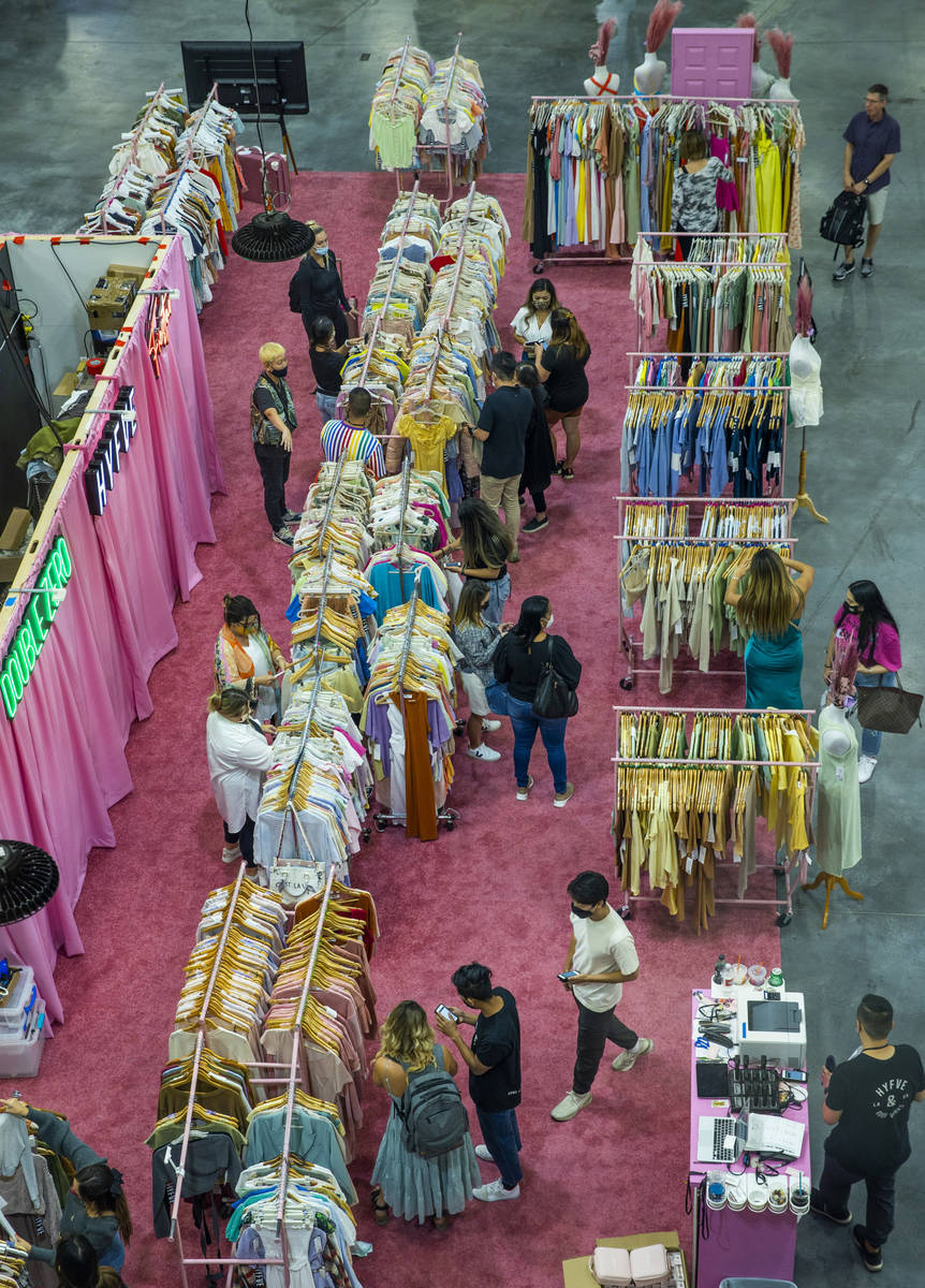 Attendees comb through new items by Double Zero, Hyfve and Fiestar and many others during the M ...