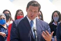 Florida Gov. Ron DeSantis speaks during a news conference, Thursday, April 8, 2021, at PortMiam ...