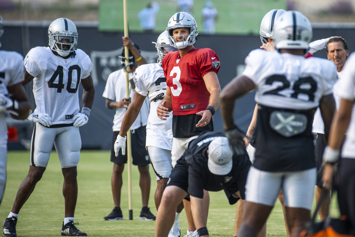 Raiders quarterback Nathan Peterman (3) looks downfield during practice at the Intermountain He ...
